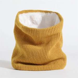 Detail of ginger knit neck warmer with thick white faux fur lining for winter warmth