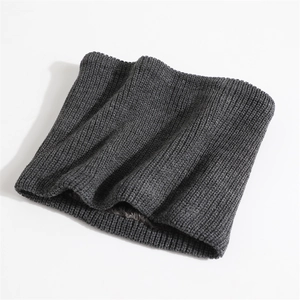 Detail of dark grey knit neck warmer featuring a thick thermal fleece lining for winter