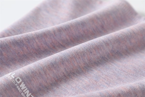 Detail of soft knit fabric texture and brand logo on the thermal outdoor neck gaiter
