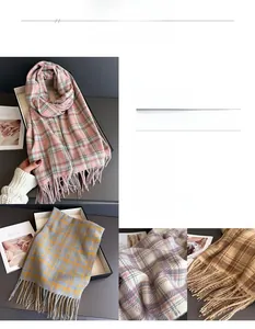 Detail shot of elegant plaid scarf texture with soft cashmere-like tassels in multiple colors