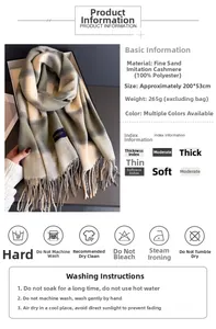 Detail showing 200x53cm plaid scarf dimensions and cashmere-like polyester fabric texture
