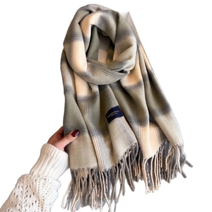 Thick autumn plaid scarf with tassels in grey and beige tones for elegant warmth