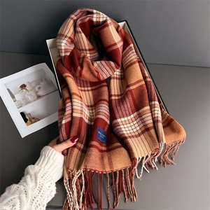 Classic red and yellow plaid pashmina scarf with fringe and soft cashmere-like texture