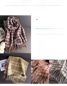 Detail of plaid scarf featuring refined tassels and thick cashmere-like texture fabric