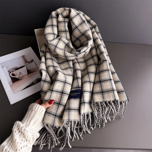 Elegant plaid scarf with classic tassels made of soft cashmere-feel fabric in beige and brown