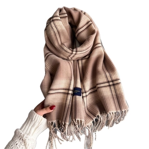 Plaid cashmere-feel winter scarf in beige and brown with tassels and woven label