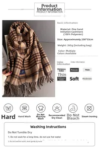 Detail specifications for classic plaid scarf showing tassel edges and fabric texture