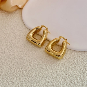 18K gold plated copper hollow geometric hoop earrings with polished metallic finish