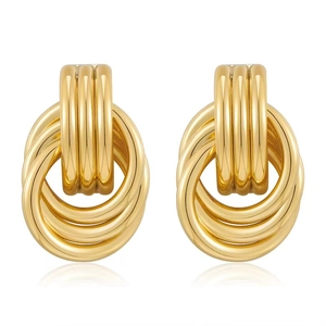 Detail of 18K gold plated multi-layer geometric hoop earrings with polished metal finish