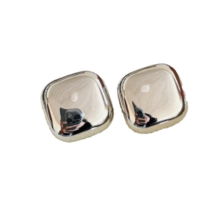 Polished silver geometric square earrings with rounded corners on white background