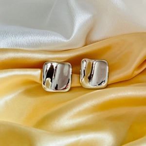 24K gold plated geometric square earrings with a liquid metal effect on silk fabric