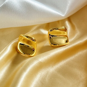 24K gold plated square geometric earrings with concave surface on white silk