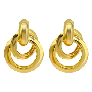 Macro view of interlocking 18K gold plated triple hoop earrings with a high-shine finish
