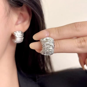 Minimalist S925 silver C-shape pleated stud earrings featuring liquid metal texture