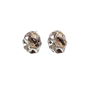 Irregular textured silver geometric earrings with polished metallic hammer finish