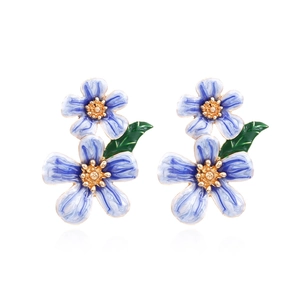 Elegant blue enamel flower stud earrings with gold alloy and green leaf details