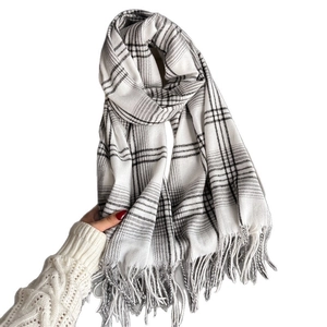 Classic white and grey checkered scarf with long fringe details for winter warmth