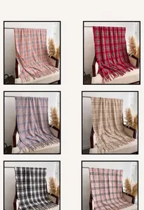 Detailed grid view of stylish plaid scarves with tassels in multiple color options