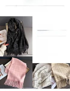 Detail view of plaid cashmere scarf with tassels in black, pink, and khaki colorways