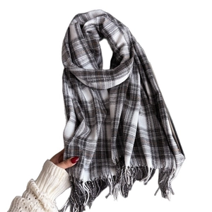 Classic British plaid scarf for winter featuring soft fringe edges and a warm texture