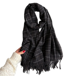 Classic plaid scarf in black, white and brown with tassels made of warm cashmere fabric