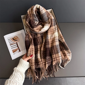 Classic autumn plaid tassel scarf in brown and caramel shades with soft cashmere-like texture