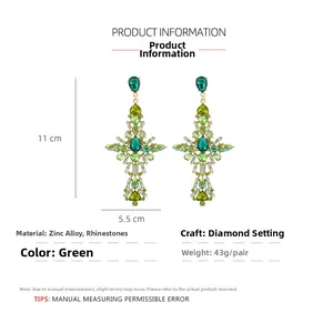 Detail view of colorful rhinestone cross earrings with size dimensions and 11cm length