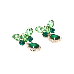 Elegant green crystal butterfly drop earrings with pear-shaped stones and gold plating