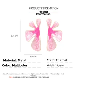 Detail showing dimensions of pink floral resin drop earrings with marble texture