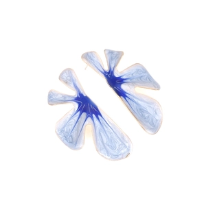 Elegant gold earrings with blue gradient enamel flower petals and artistic marble texture