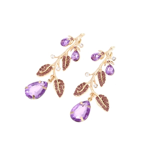 Chic gold-toned leaf branch earrings with purple rhinestones and teardrop pendants