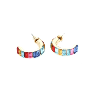 Detail view of gold C-shaped earrings with vibrant multi-colored rectangular gemstones
