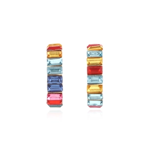 Macro view of C-shaped earrings featuring vertical rows of vibrant rainbow baguette crystals