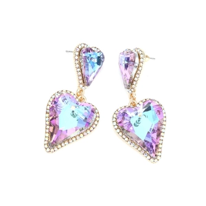 Detail of luxury heart-shaped gradient crystal earrings with gold plating and rhinestones