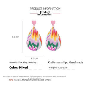 Size details of handmade pink heart teardrop clay earrings with colorful wave patterns