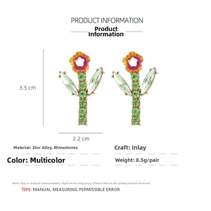 Detail showing dimensions of floral cactus earrings with green and pink rhinestones