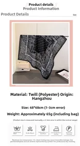 Detail showing 68x68cm black and white paisley square scarf with herringbone texture