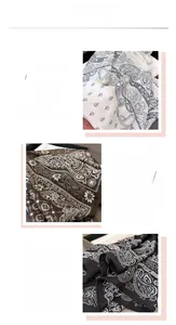 Detailed view of paisley patterns and herringbone texture on cotton-feel scarves