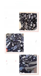 Detail of herringbone texture and floral print on navy blue square scarf for women