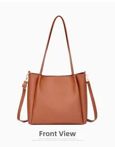 Front view of a brown faux leather tote bag with top handles and adjustable shoulder strap