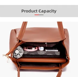 Top view of brown leather handbag interior showing large capacity for daily essentials