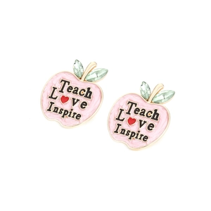 Detail of pink enamel apple earrings with Teach Love Inspire text and green crystals