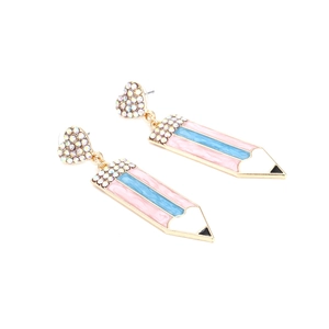 Detail of pink and blue enamel pencil earrings with heart-shaped crystal studs