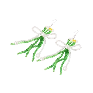 Boucles d'oreilles fleuries faites main avec nœuds papillon verts et pompons longs