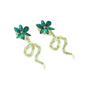 Elegant gold snake drop earrings with green crystals and floral stud design