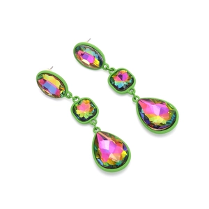 Macro shot of colorful iridescent faceted stones with vibrant neon green lacquered borders