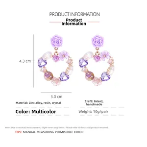 Detailed view of purple flower heart earrings with dimensions 4.3cm x 3.0cm