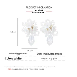 Detail view of handmade beaded flower earrings with dimensions 4.0cm height and 2.6cm width