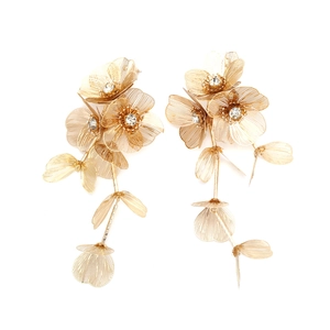 Exaggerated gold metal flower tassel earrings with mesh petals and sparkling crystal centers