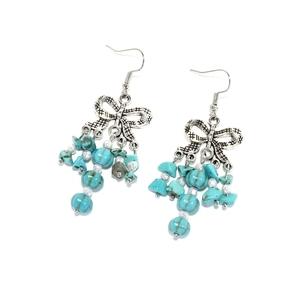 Boucles d'oreilles nœud vintage avec glands turquoise et perles argentées ethniques